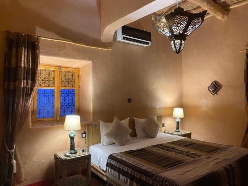 Cama o camas de una habitación en Riad Paradise of Silence
