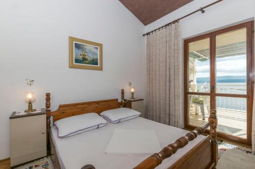 Posteľ alebo postele v izbe v ubytovaní Apartments Neno