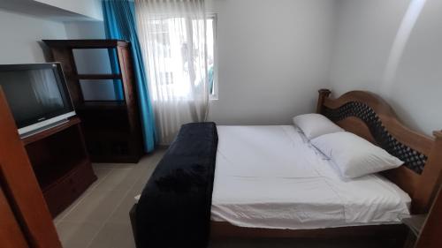 Ένα ή περισσότερα κρεβάτια σε δωμάτιο στο Casa San Gabriel