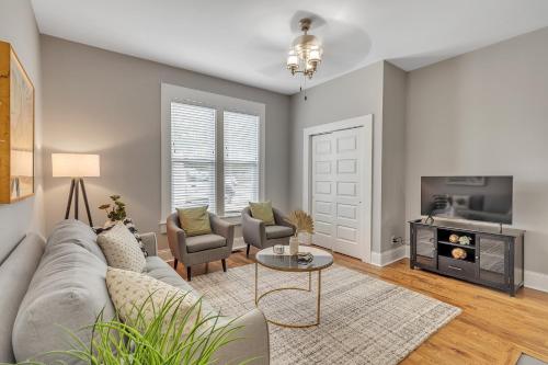 a living room with a couch and chairs and a table at Recently Renovated Home in the Heart of Bellevue! home in Bellevue