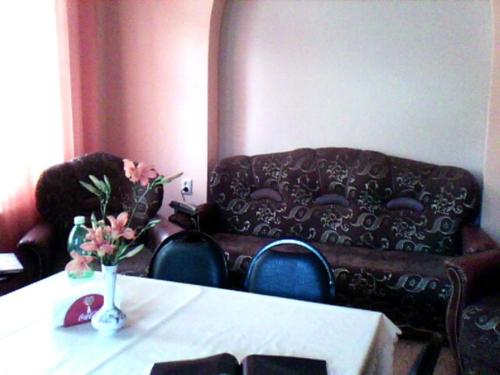 Гостиная зона в White Guest House