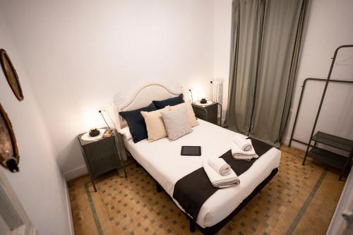 Katil atau katil-katil dalam bilik di HiHome Hostel Uría