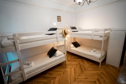 Katil atau katil-katil dalam bilik di HiHome Hostel Uría
