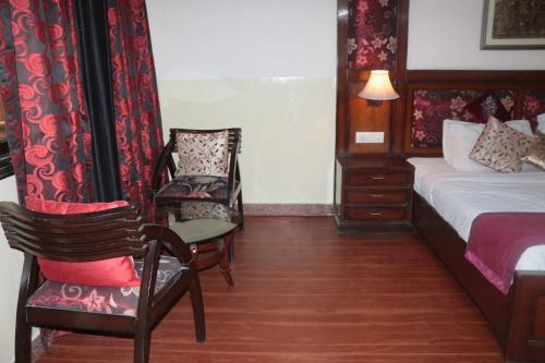 Letto o letti in una camera di Hotel New Empire