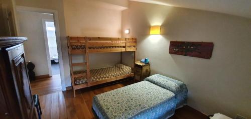 Двухъярусная кровать или двухъярусные кровати в номере Corte Dei Frati