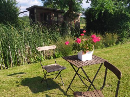Κήπος έξω από το Gîte Cosy Grand confort dans un écrin de verdure