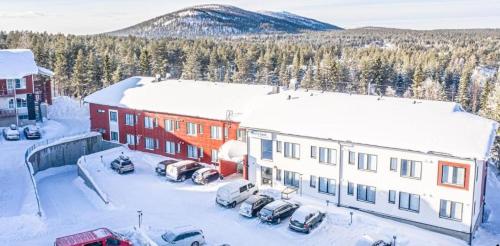 an aerial view of a building in the snow at Ski Studio Levi in Levi