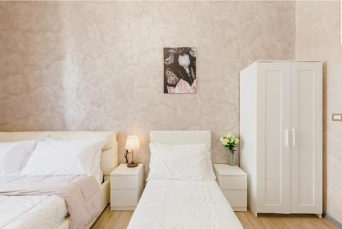Letto o letti in una camera di Rome Place