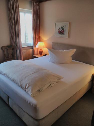 Ліжко або ліжка в номері Landhotel Hirsch