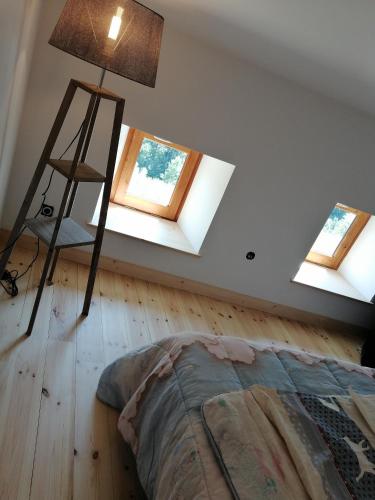 Postel nebo postele na pokoji v ubytování Spécial Couple - Gîte 3 étoiles en Auvergne - Gorges Allier 43