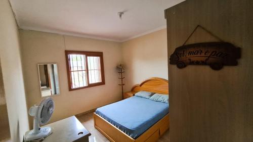Tempat tidur dalam kamar di MARÉ 2 - brisa do mar