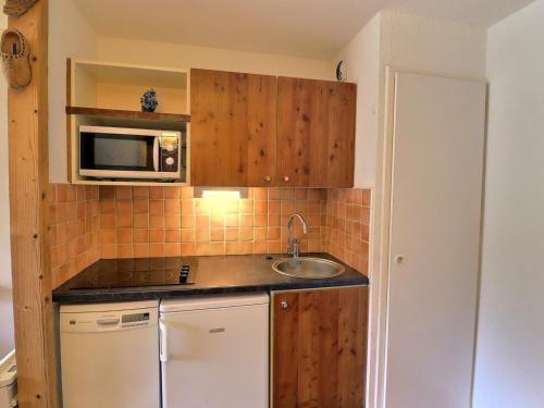 A cozinha ou cozinha compacta de Appartement Méribel, 3 pièces, 6 personnes - FR-1-182-108