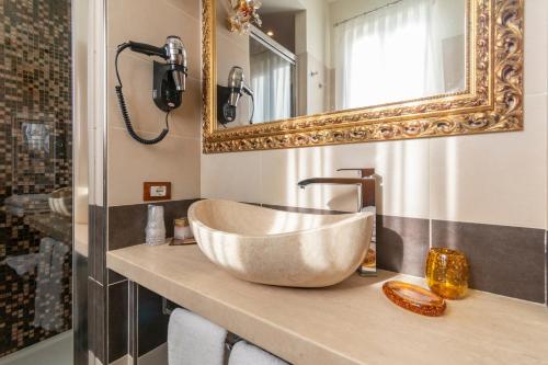Ванная комната в Hotel Villa Tiziana