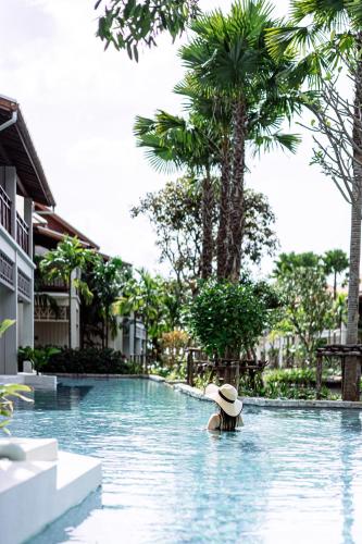 Bazén v ubytování Grand Mercure Khao Lak Bangsak nebo v jeho okolí