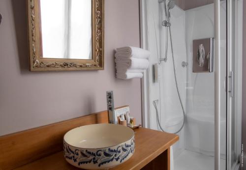 Ванная комната в Hotel de Charme La Bonne Adresse