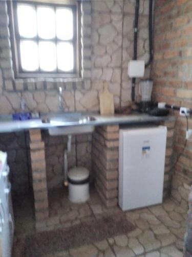 Köök või kööginurk majutusasutuses Chalé Rústico