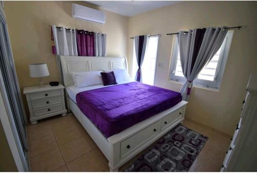 Letto o letti in una camera di Wintberg Tropical Villas