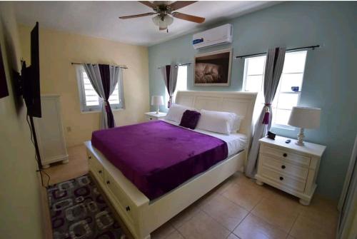 Letto o letti in una camera di Wintberg Tropical Villas