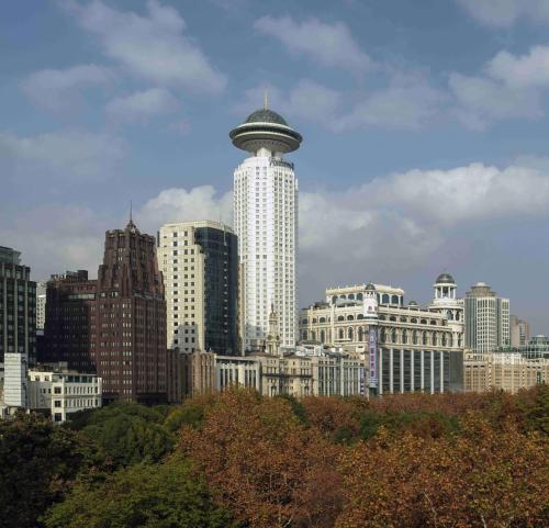 a view of a city skyline with a tall building at Radisson Blu Hotel Shanghai New World in Shanghai