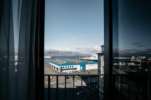 a view of a building from a window at Exeter Hotel in Reykjavík