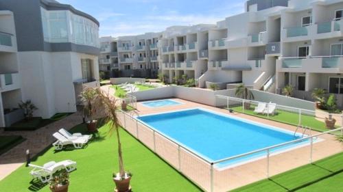 Fotografie z fotogalerie ubytování Lollipop con piscina, doble terraza, planta alta, cocina completa y WIFI v destinaci Corralejo
