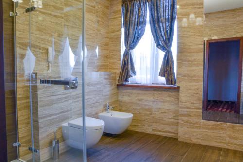 Kylpyhuone majoituspaikassa Komoda Club Residence
