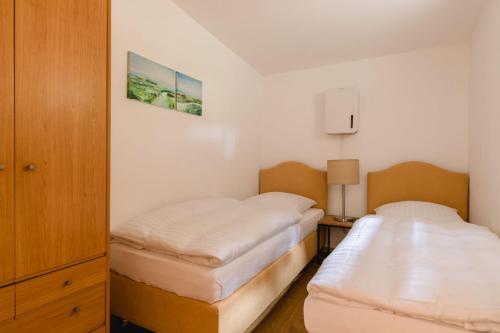 Llit o llits en una habitació de Haus Panoramablick
