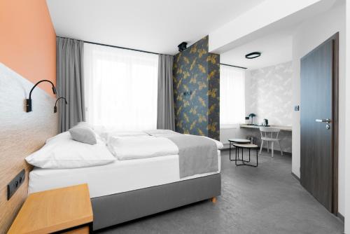 Voodi või voodid majutusasutuse Hotel Diana toas