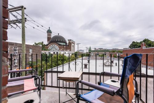 a view from the balcony of a playground at 2 Bedroom Luxury in the Mile End by Den Stays in Montréal