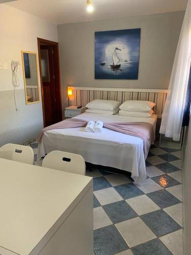 Кровать или кровати в номере Pousada Marina da Praia