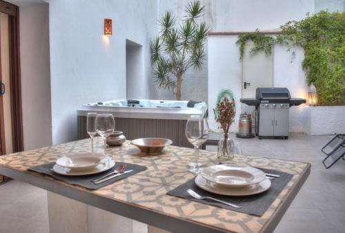 En restaurang eller annat matställe på Home Apartments Jerez