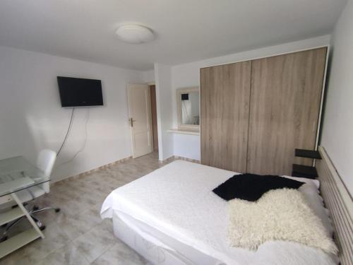 Кровать или кровати в номере Villa Denube Fuerteventura