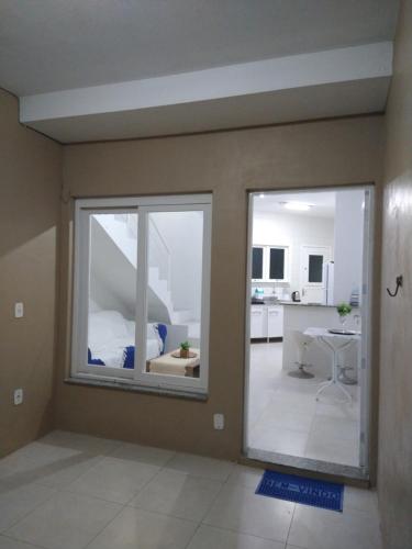 Ένα μπάνιο στο Apartamento BLUE 04 - 100 metros da praia