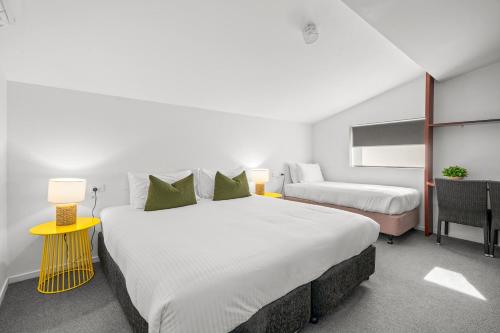 Grand Hotel and Studiosにあるベッド