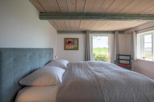 Ένα ή περισσότερα κρεβάτια σε δωμάτιο στο Reethüs Rosenkranz