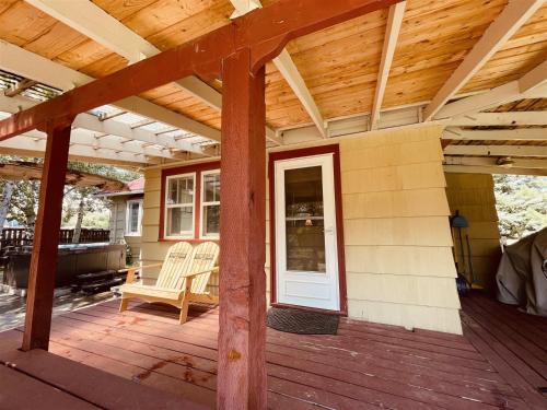 a porch of a house with a wooden roof at Mavericks Corner in Red Lodge