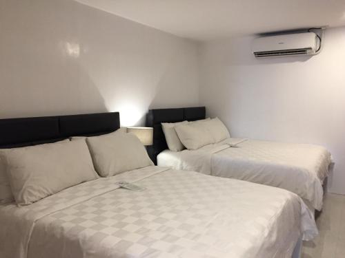 Katil atau katil-katil dalam bilik di Tely's Bed & Breakfast Iloilo powered by Cocotel