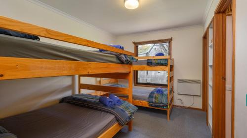 Dviaukštė lova arba lovos apgyvendinimo įstaigoje Currawong Lodge