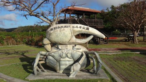 a statue of a crab with a boat on its back at Kaze -SEVEN Hotels and Resorts- in Higashi