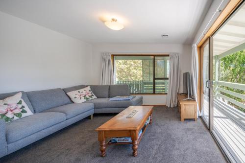 A seating area at Libeau Lane Views - Akaroa Holiday Home
