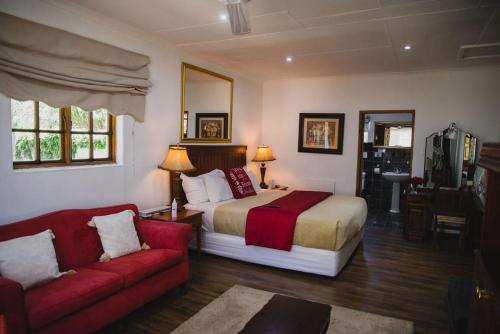 Χώρος καθιστικού στο Lydenburg Manor Guest House