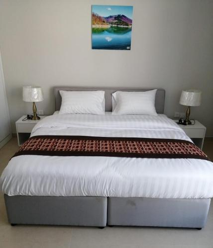 Postel nebo postele na pokoji v ubytování JOOD RESIDENCE