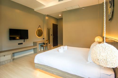 TV a/nebo společenská místnost v ubytování SeaRidge Hua Hin Resort & Poolvilla