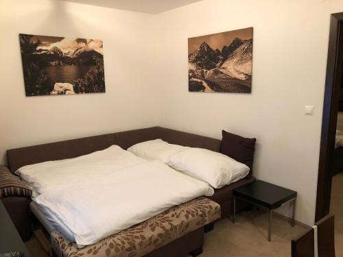 Кровать или кровати в номере Apartman Panorama 805