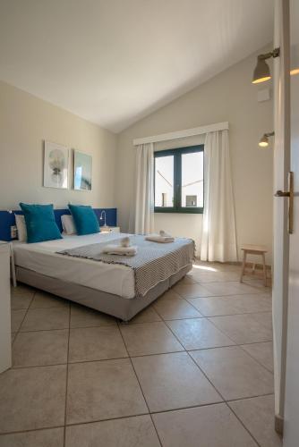 Una cama o camas en una habitación de GT Beach