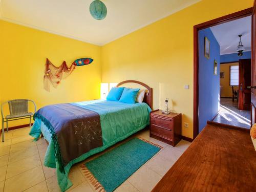 Postel nebo postele na pokoji v ubytování Apartamento encantador perto da praia, em Sao Jacinto