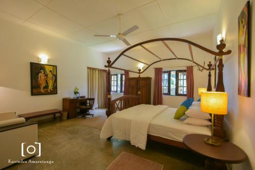 Postel nebo postele na pokoji v ubytování Captain's Bungalow, Kandy