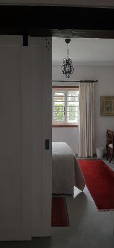 Postel nebo postele na pokoji v ubytování Kimi's Cottage