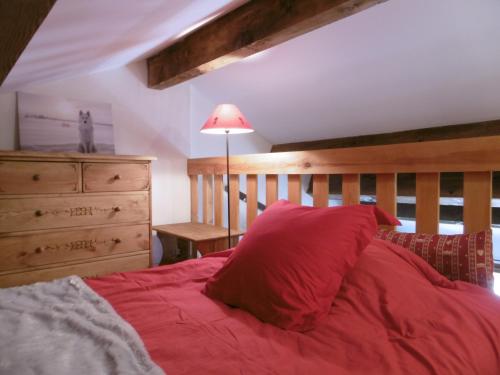 מיטה או מיטות בחדר ב-Le logis des cerfs
