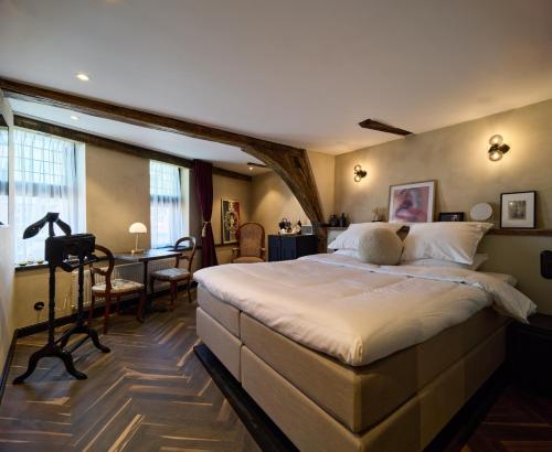 Postel nebo postele na pokoji v ubytování Boutique Hotel & Restaurant Frenchie
